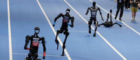 Unitree Robotics and Tiangong humanoid robots compete in the 100m final at the inaugural World Humanoid Robot Games, at the National Speed Skating Oval in Beijing, China August 17, 2025