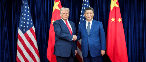 U.S. President Donald Trump, left, greets Chinese President Xi Jinping, right, before a bilateral meeting at Gimhae Air Base, October 30, 2025, in Busan, South Korea. 