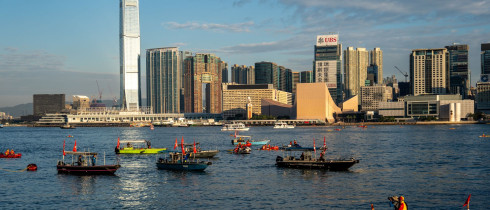 Swimmers participate in the Victoria Harbour Race in Victoria Harbor on November 22, 2025 in Hong Kong