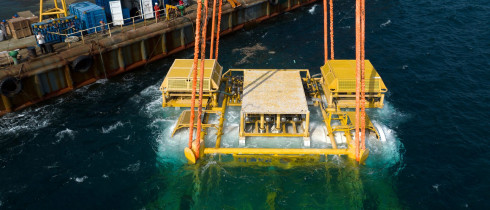 A drone photo taken on Feb. 18, 2025 shows Hainan's commercial underwater intelligent computing cluster being lowered into the sea near Lingshui Li Autonomous County in south China's Hainan Province