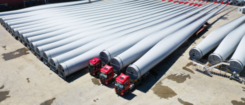 A drone photo shows wind turbine blades at the Mingyang New Energy Intelligent Manufacturing Industrial Park in Baotou, north China's Inner Mongolia Autonomous Region, July 29, 2025.