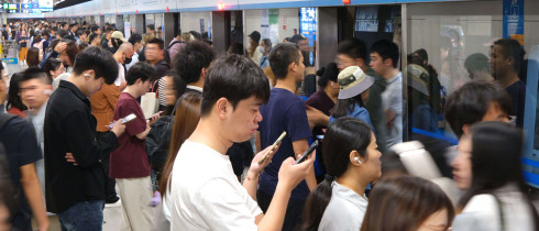 People travel by subway at Zhichun Road Subway Station in Beijing, China on September 17, 2025.