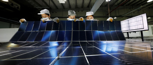 orkers are manufacturing photovoltaic module export products in the production workshop in Suqian City, Jiangsu Province, China on July 22, 2025.