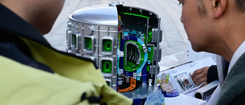 People view a model of the Burning Plasma Experimental Superconducting Tokamak (BEST)