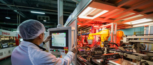 A worker is producing an export order for photovoltaic equipment on a company's production line in Sihong County Economic Development Zone, Suqian City, Jiangsu Province, China on February 24, 2026