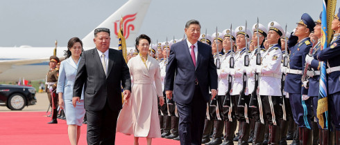 In this photo provided by the North Korean government, North Korean leader Kim Jong Un, front left, and his wife Ri Sol Ju, see off Chinese President Xi Jinping, center right, and his wife Peng Liyuan at the airport in Pyongyang, Tuesday, June 9, 2026. 